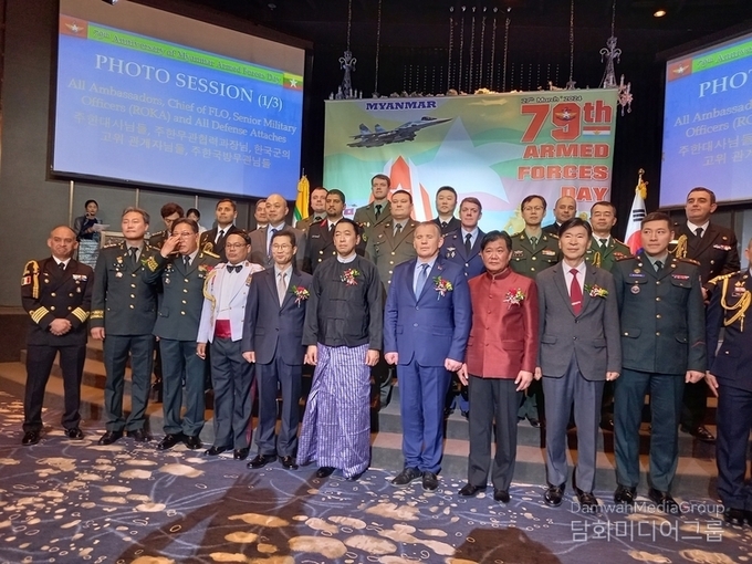 Amb. U Thant Sin of Myanmar to Korea (6th from the left, front row) take a group photo with foreign ambassadors and other guests at the gala event to celebrate the 79th Anniversary of Myanmar Armed Forces Day held at the Riverside Hotel in Seoul on March 27